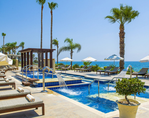 Adults only pool located on the beach of a blue flag beach at Alexander the Great Beach Hotel Paphos